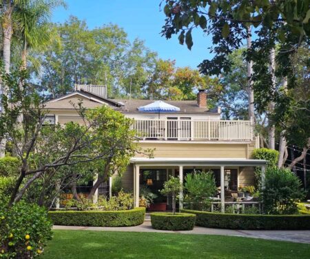 The garden and Victorian exterior of Simpson House Inn in Santa Barbara
