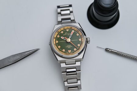 Singer Reimagined 1970 DualTrack GMT watch on integrated stainless steel bracelet