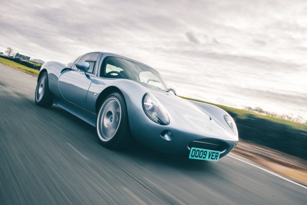 The Wells Vertige Makes the Case for the Small Analogue Sports Car Wells Vertige compact British sports car on a country road