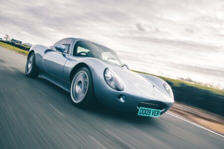 Wells Vertige compact British sports car on a country road