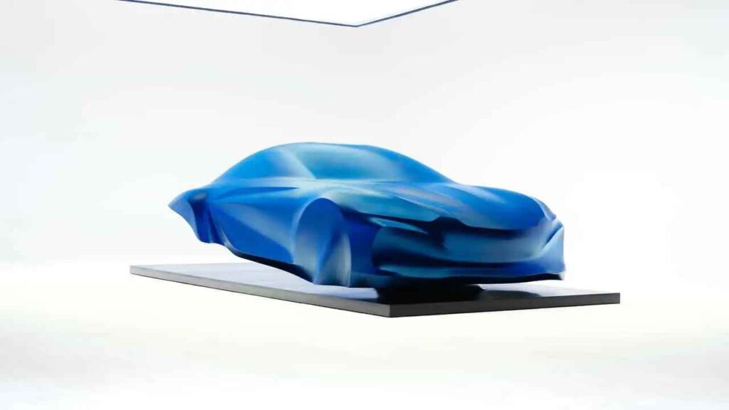 Alpine next-generation A110 EV design sculpture previewing a low swoopy electric sports car