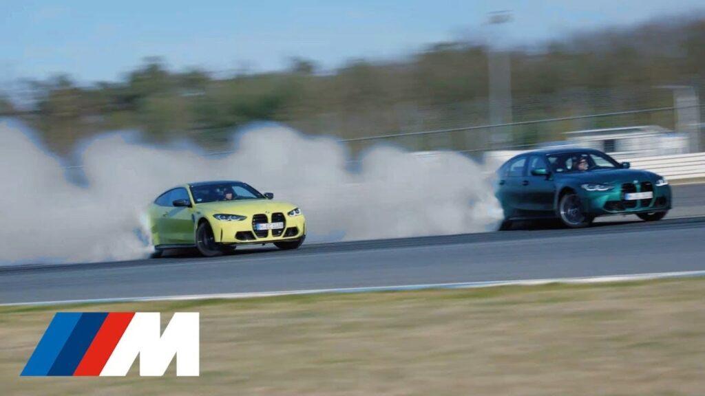 BMW performance coupe drifting on a test track