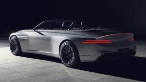 Illustration of a sleek open-top Hyundai grand tourer with a long bonnet and rear-set cabin