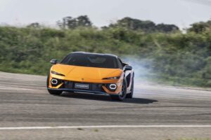 Lamborghini Temerario hybrid supercar driving on a dramatic road