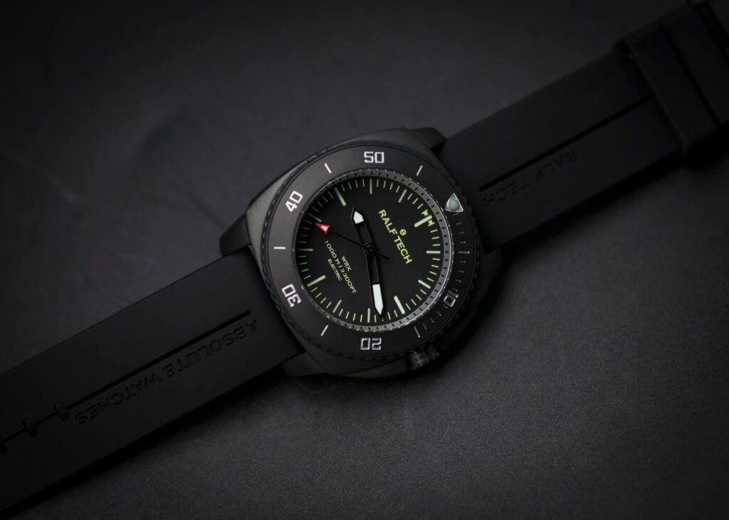 How a Search for a Quartz GADA Watch Ended With the RALF TECH WRX Electric RALF TECH WRX Electric Black Operator black tool watch on a dark industrial surface