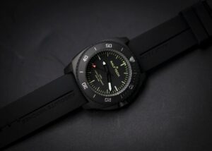 RALF TECH WRX Electric Black Operator black tool watch on a dark industrial surface