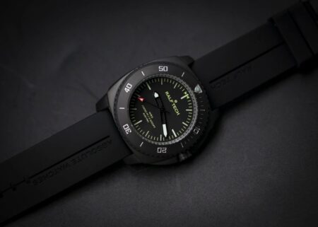 RALF TECH WRX Electric Black Operator black tool watch on a dark industrial surface