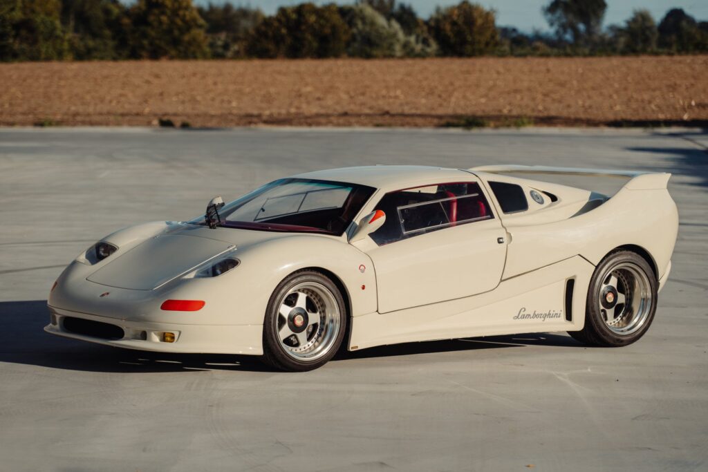 The MCA Centenaire Was Monaco’s Carbon-Fibre Supercar That Arrived Too Early Ivory white Monte Carlo Automobile Centenaire supercar with red interior