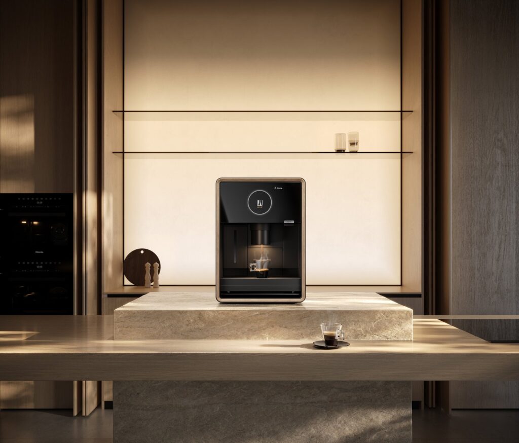 Loewe aura.matic Turns the Home Coffee Machine Into a Design Object Loewe aura.matic automatic coffee machine with aluminium housing, glass door and wooden frame