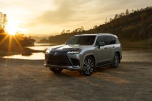 2027 Lexus LX flagship SUV shown in a refined urban setting