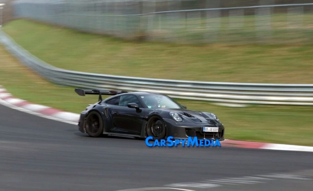 Porsche’s Next 911 GT2 RS Could Arrive With Hybrid Power in 2027 Porsche 911 GT2 RS prototype imagined testing on a racetrack