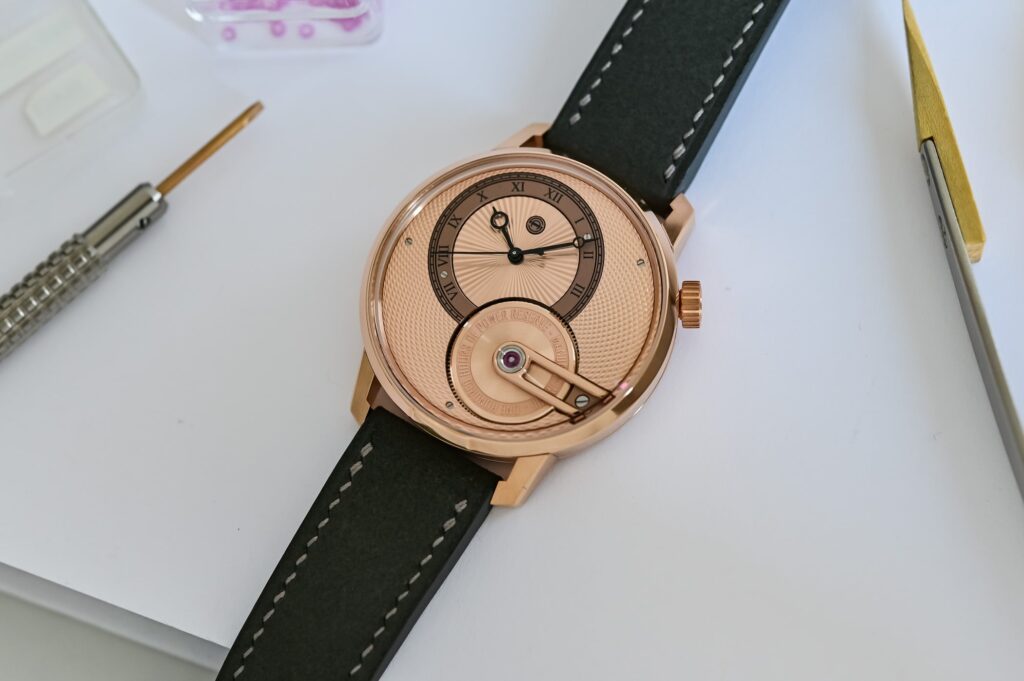 Armin Strom Tribute³ Au750 rose gold watch with guilloché dial