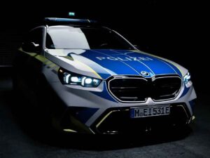 BMW M5 Touring in German police-style livery with roof lights