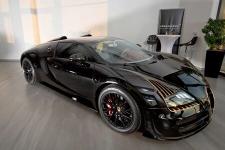 Bugatti Veyron Grand Sport Vitesse Black Bess with black paint and gold grille detailing