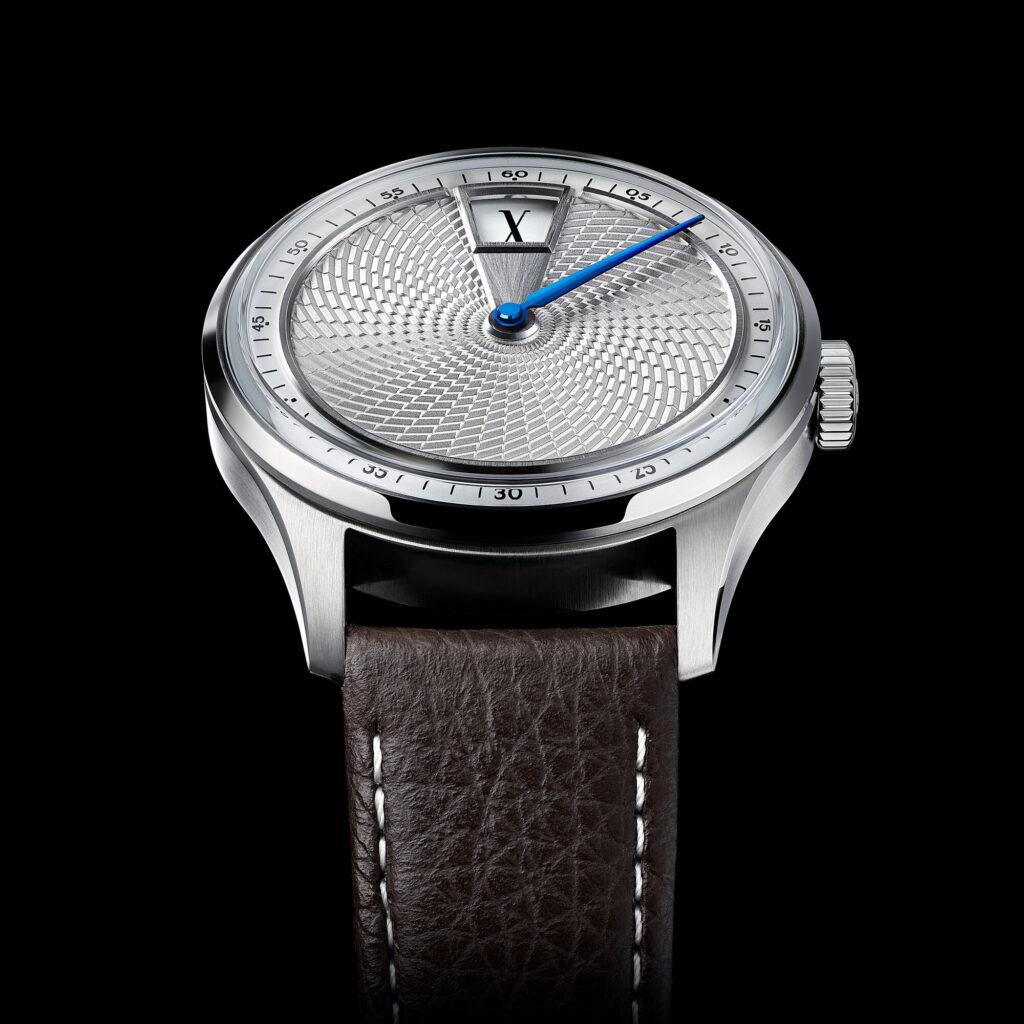 Christopher Ward’s C1 Jump Hour XV marks 15 years of in-house ambition Christopher Ward C1 Jump Hour XV limited edition watch with rhodium silver guilloche dial