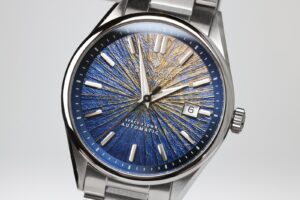 Diatom Inner Worlds Mercury watch with blue and gold textured planetary dial on steel bracelet