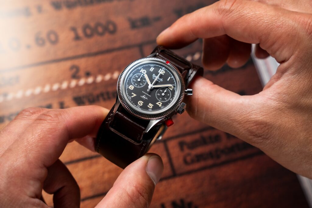 Hanhart’s 417 ES Steve McQueen Limited Edition Puts the King of Cool on a Hand-Wound Flyback Hanhart 417 ES Steve McQueen Limited Edition No. 1 on a dark brown cuff strap