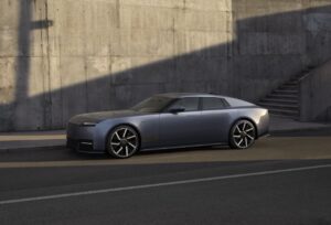 Jaguar Type 01 electric grand tourer with sharp bodywork and slim LED headlights