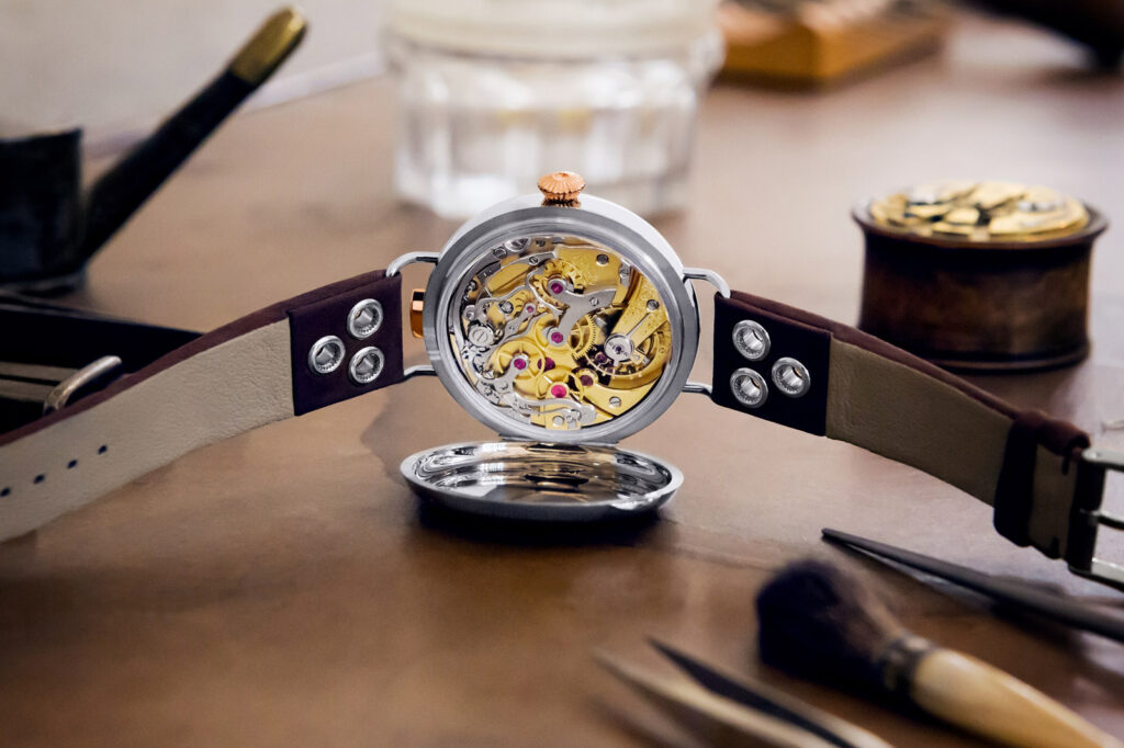 The Enduring Pull of Watches Powered by New Old Stock Movements Panerai Radiomir and Doxa chronograph watches representing New Old Stock movement collecting