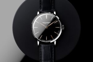Pequignet Attitude Onyx watch with black onyx dial and rose-gold-coloured details