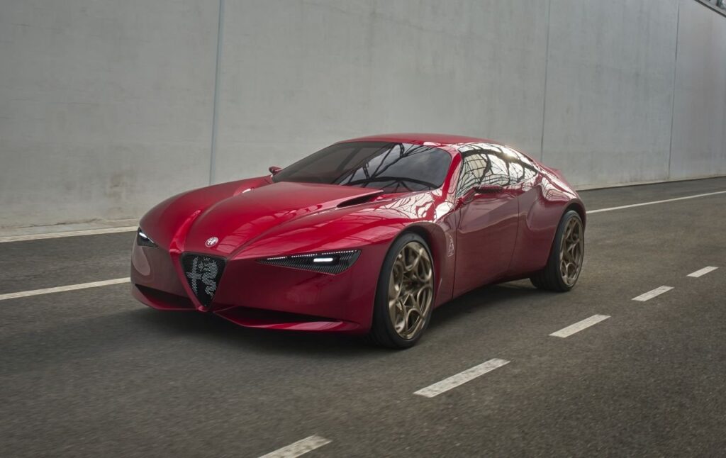 Alfa Romeo Cuorerosso Concept Points to a Sleeker Four-Door Future Alfa Romeo Cuorerosso concept four-door GT with triangular grille and gold wheels