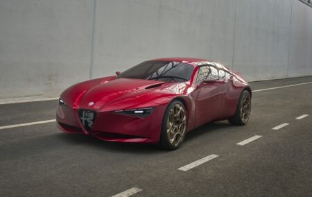Alfa Romeo Cuorerosso concept four-door GT with triangular grille and gold wheels
