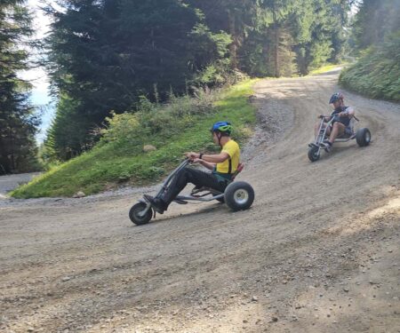 Mutteralm Is Innsbruck’s Easy Alpine Escape With a Five-Kilometre Mountain Cart Descent Mountain cart trail at Mutteralm above Innsbruck with Alpine scenery