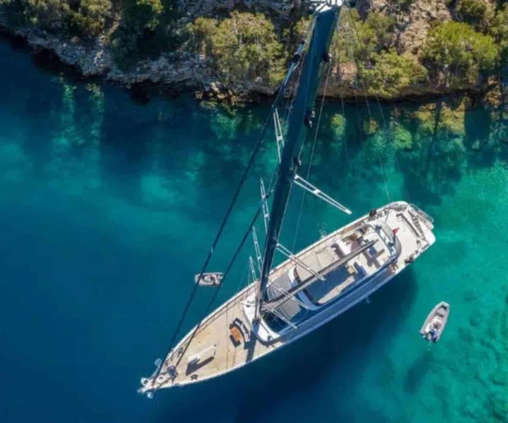 Traditional wooden gulet anchored in turquoise water on the Turkish coast