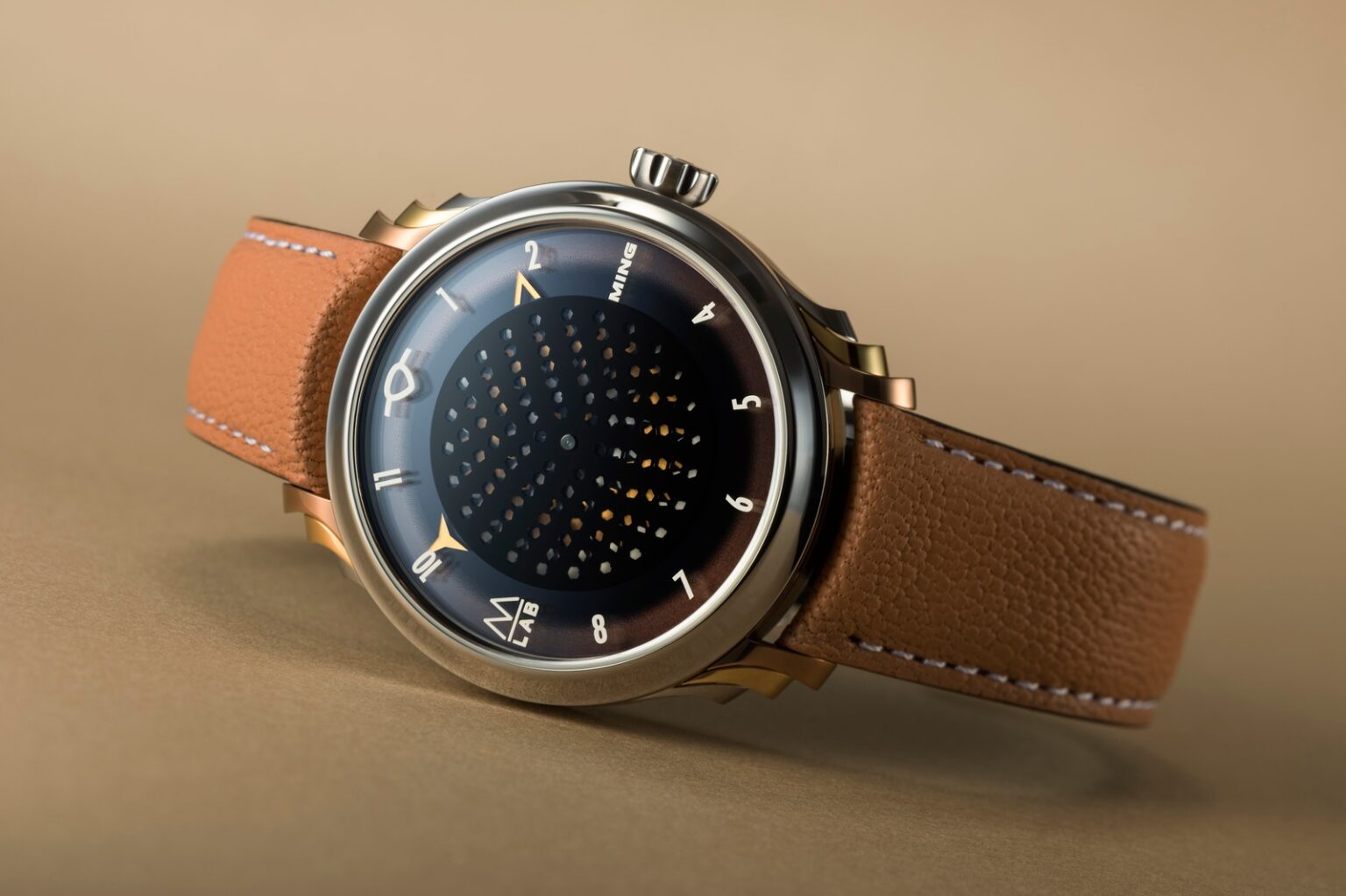 Ming and Massena LAB Turn the Honeycomb Dial Into a Secret Watch Ming x Massena LAB 57.09 Secret Honey with rotating honeycomb dial and titanium case