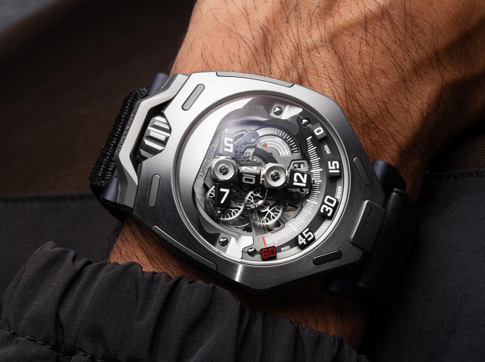 Urwerk Reimagines Wandering Hours With the UR-300 Time Quantum Urwerk UR-300 Time Quantum in titanium with wandering hours T-frame display