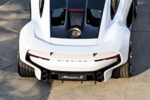 Leaked rear view of the Porsche Mission S concept showing glass roof panels, wide fenders and stacked quad exhausts