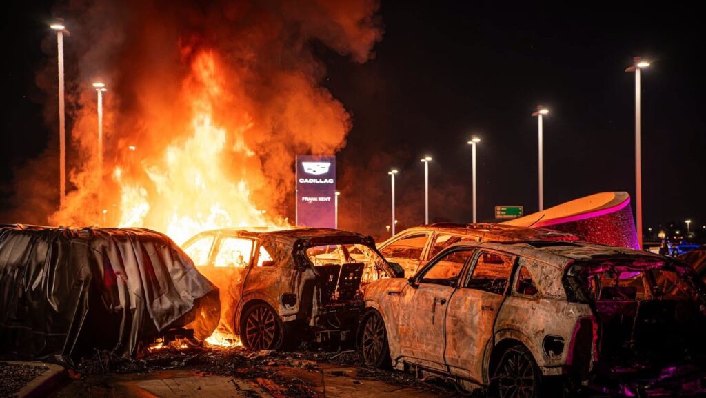 Six Cadillac Escalade IQ Electric SUVs Destroyed in Fort Worth Dealership Fire Burned electric SUVs at a Cadillac dealership fire scene in Fort Worth