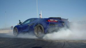 C8 Corvette shown from the rear three-quarter angle on a road