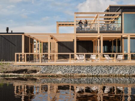 Wellness Architecture Is Rewriting the Luxury Home A serene modern luxury home interior with soft daylight, natural materials and calm minimalist design