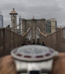 Crowded New York watch fair floor with collectors viewing independent and microbrand watches
