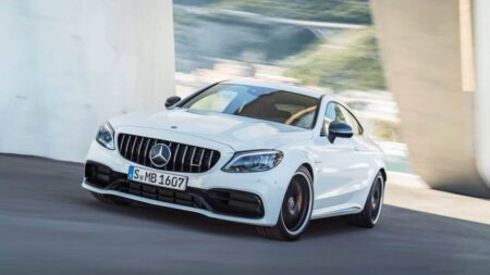 Mercedes-AMG C63 May Be Headed for a Petrol and Electric Split Mercedes-AMG C63 performance sedan on a road