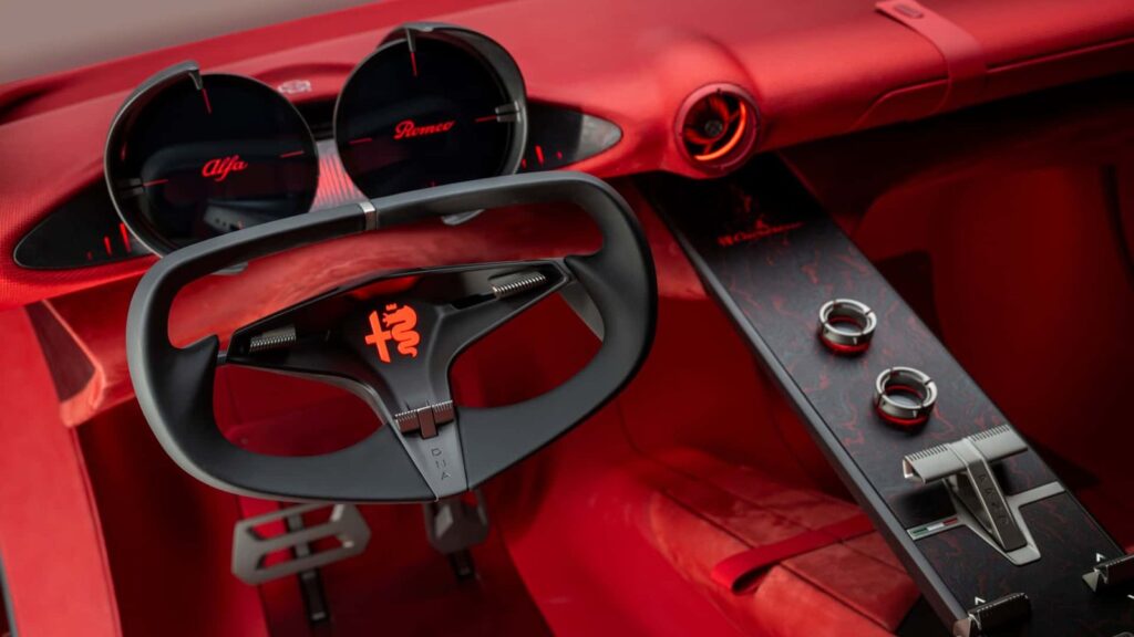 Alfa Romeo’s Design Boss Wants Car Screens to Step Back Alfa Romeo Cuorerosso concept interior with a clean dashboard design