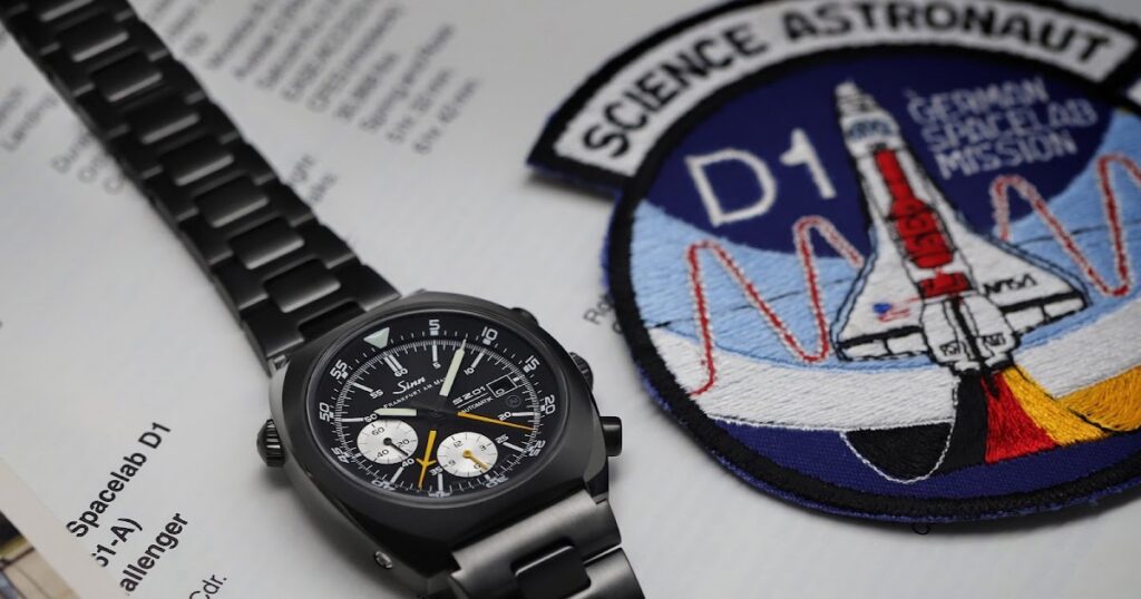 Sinn 140 A S Anniversary chronograph with black case, matte black dial and yellow chronograph hands