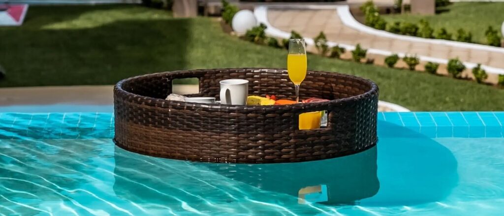 What Sets Truly Luxury Travel Experiences Apart A serene luxury villa terrace surrounded by nature with refined outdoor seating and a private pool