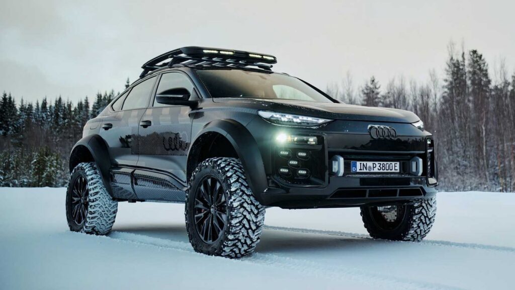Conceptual rugged Audi SUV on an off-road trail in a forest setting
