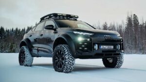 Conceptual rugged Audi SUV on an off-road trail in a forest setting