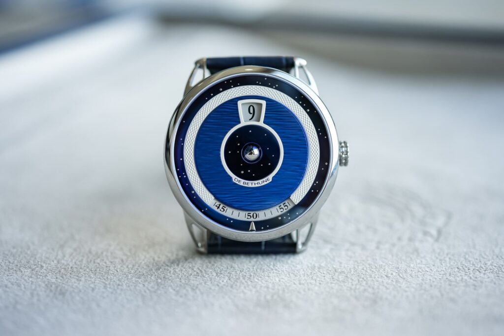 De Bethune’s DB25 Digitale Recasts the Jumping Hour for a Sharper Era De Bethune DB25 Digitale with blued titanium dial and spherical moon phase