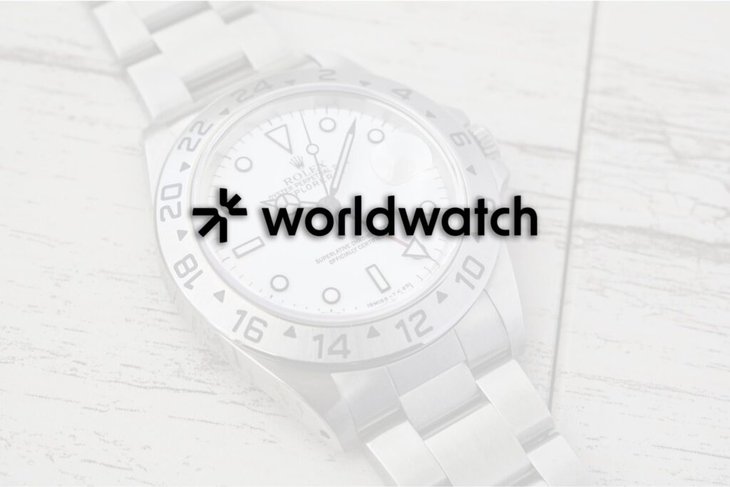 The Pre-Owned Watch Market Needs a Proper Memory Vintage wristwatch with documents and a loupe on a dealer’s desk